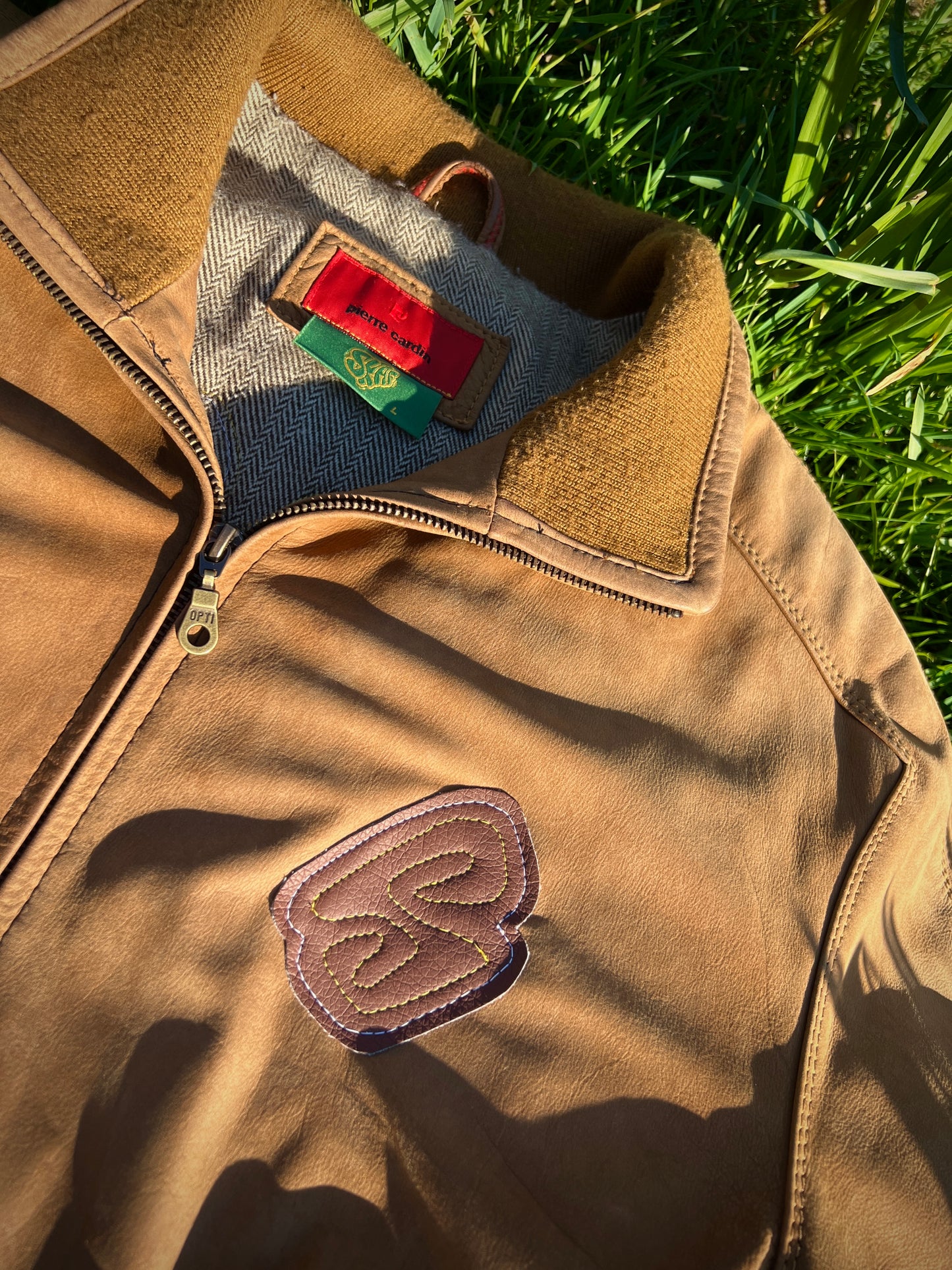 Distorted love leather patch jacket