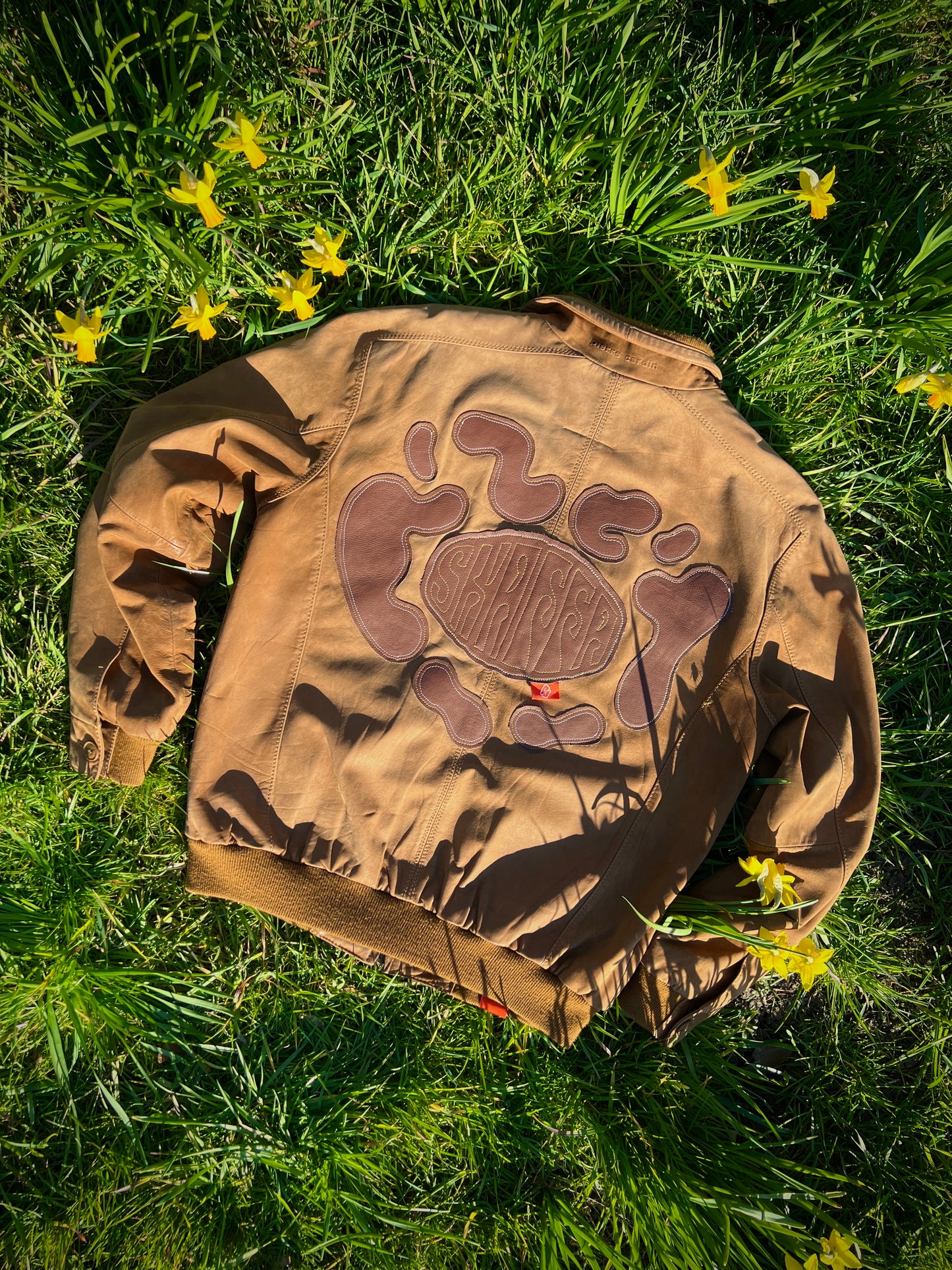 Distorted love leather patch jacket