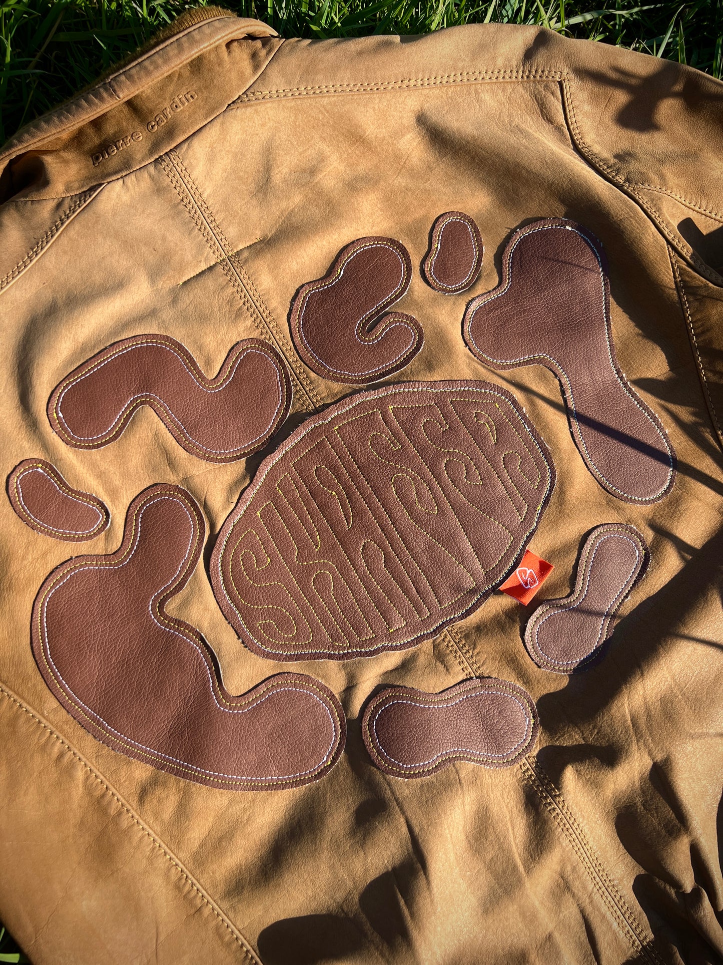 Distorted love leather patch jacket